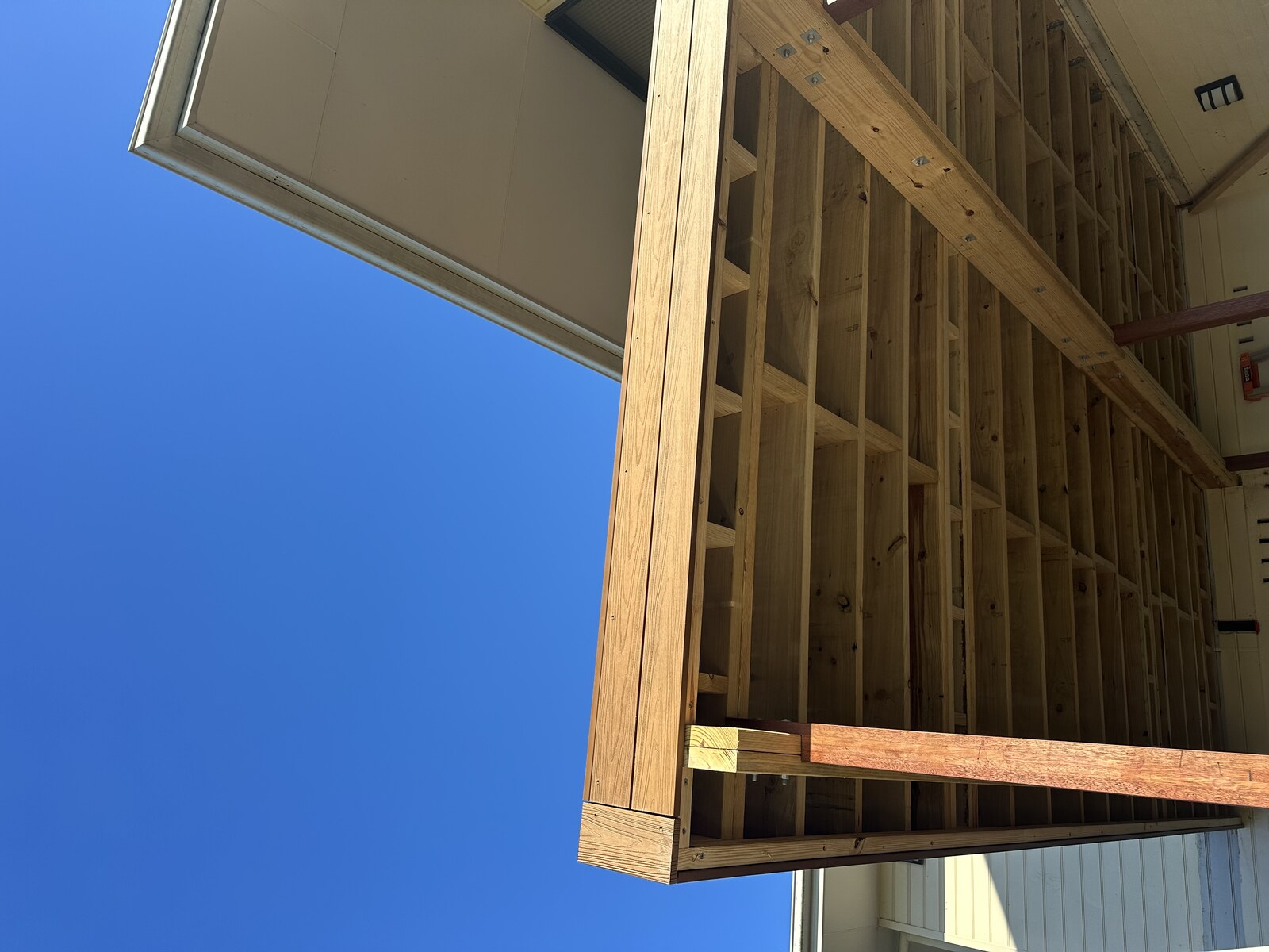Deck beam detail against blue sky